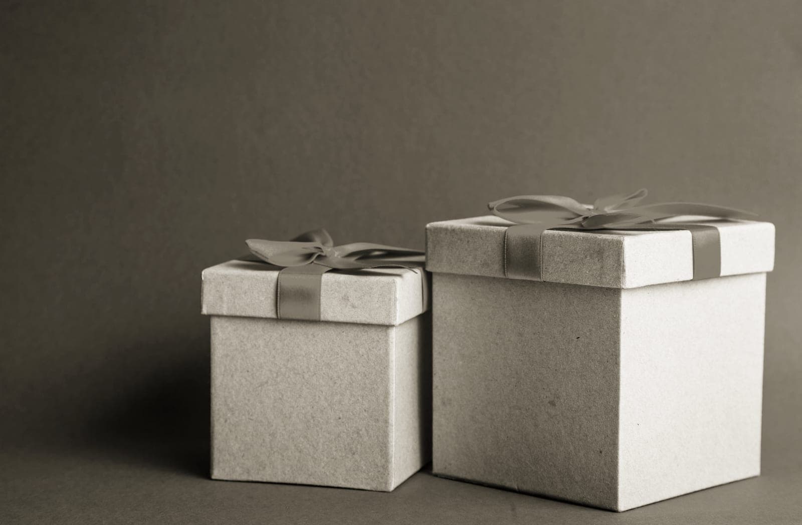 A wrapped gift box on a neutral surface